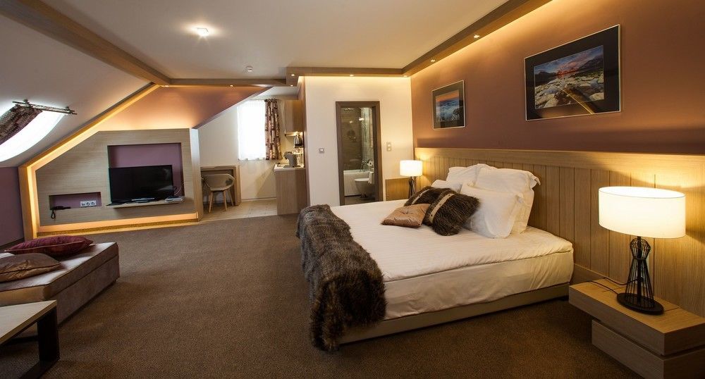 Amira Boutique Hotel Bansko Exterior foto A bedroom at the Hotel de la Poste