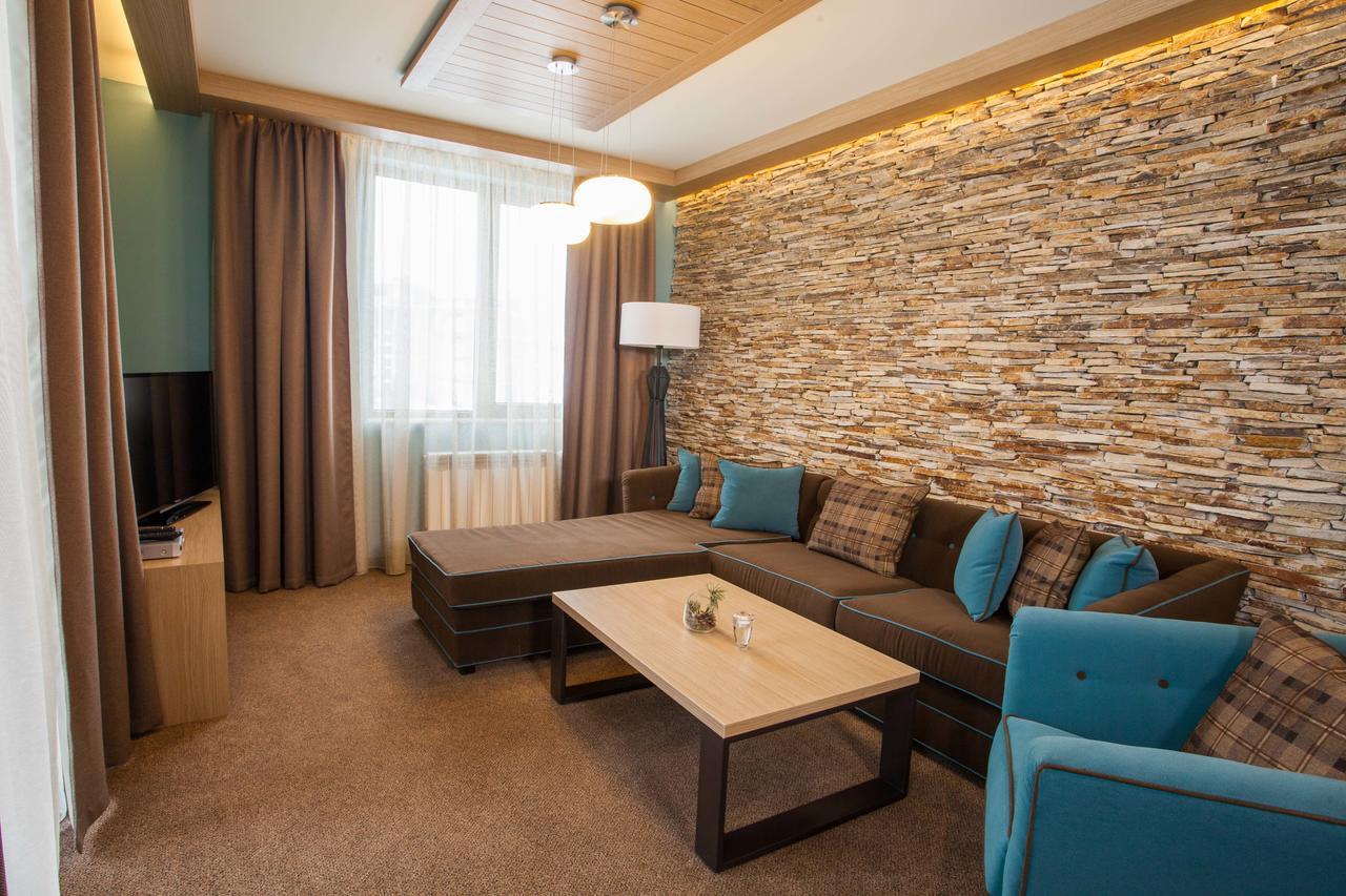 Amira Boutique Hotel Bansko Exterior foto A living room in a hotel