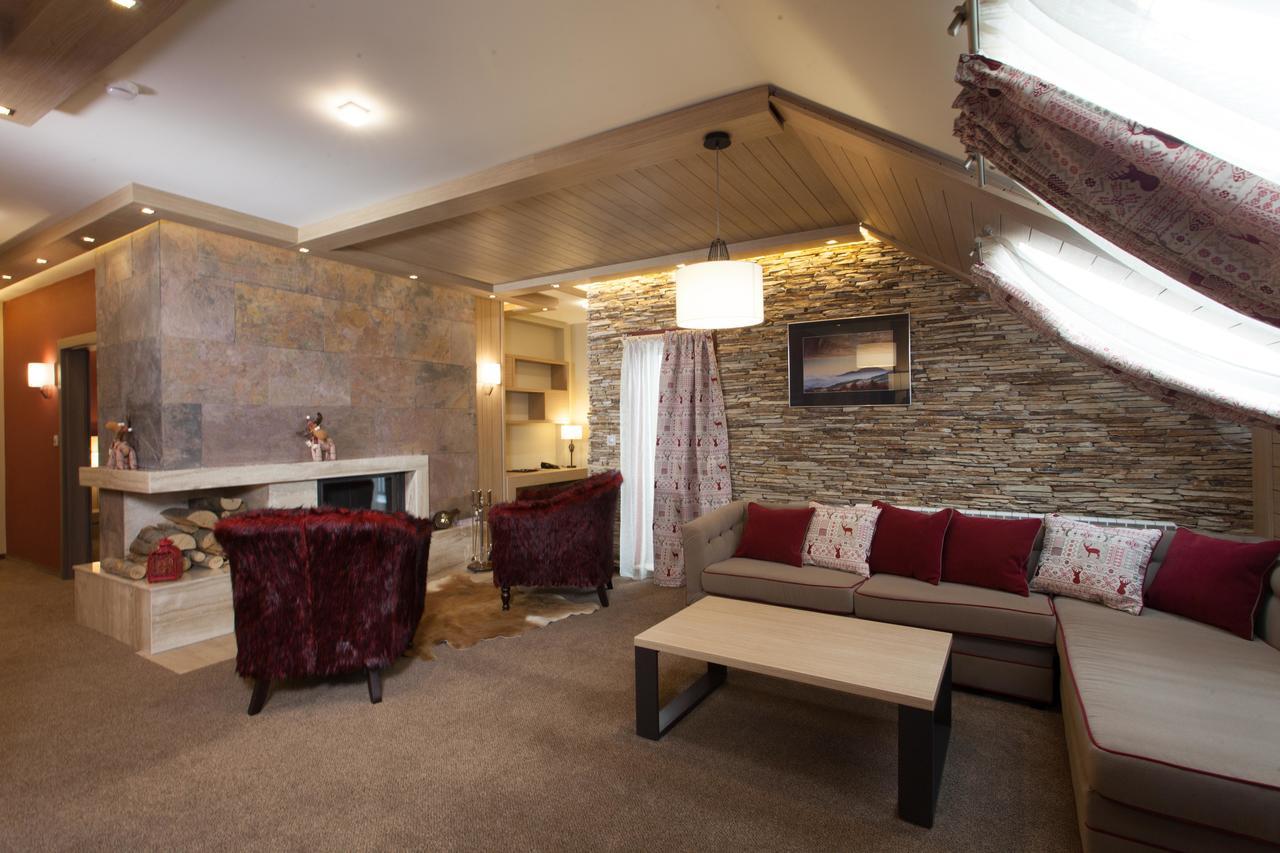 Amira Boutique Hotel Bansko Exterior foto Interior of a suite at the hotel